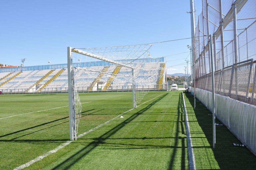 Rear net support system for full-size football goals